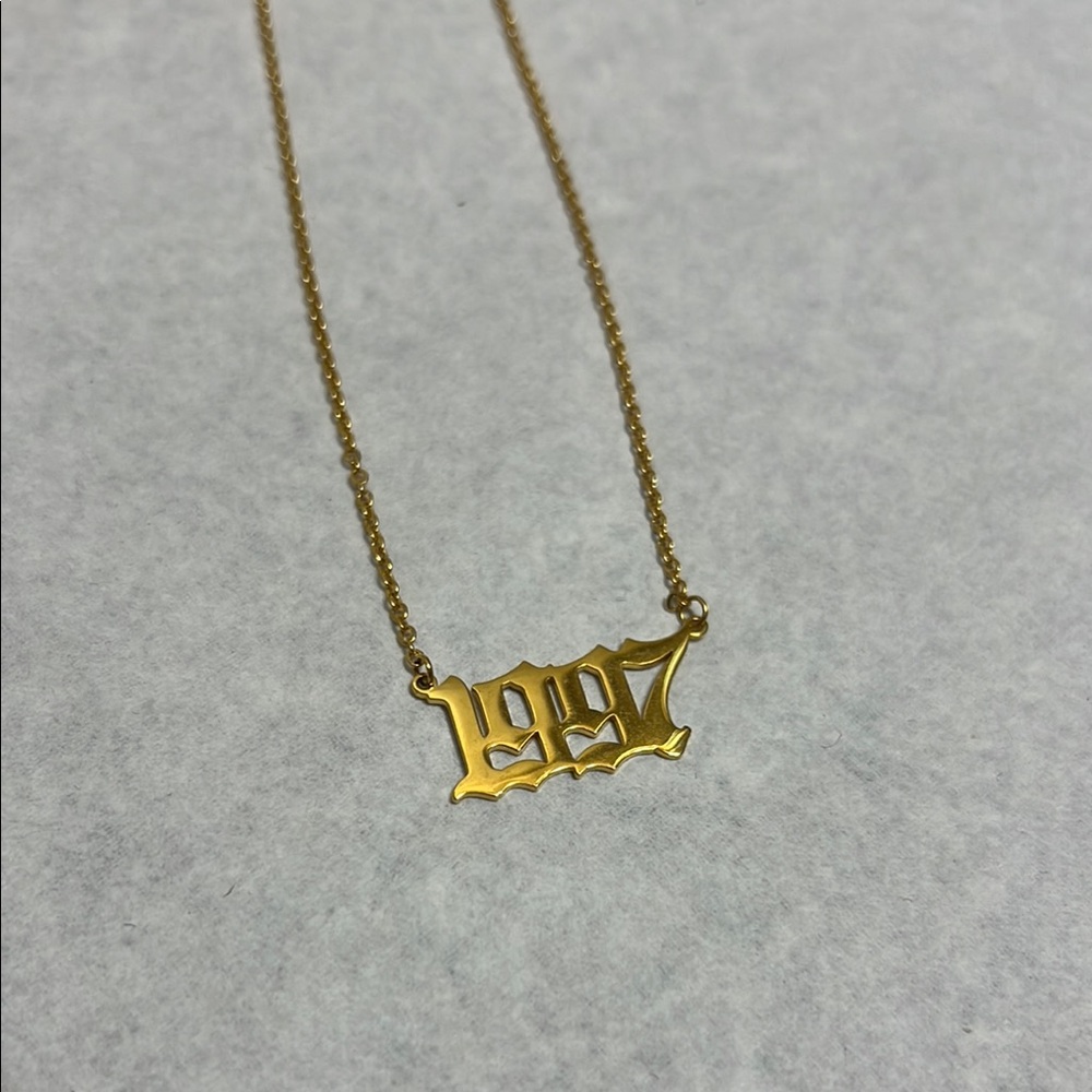 Gold Necklace with 1997 Year Pendant